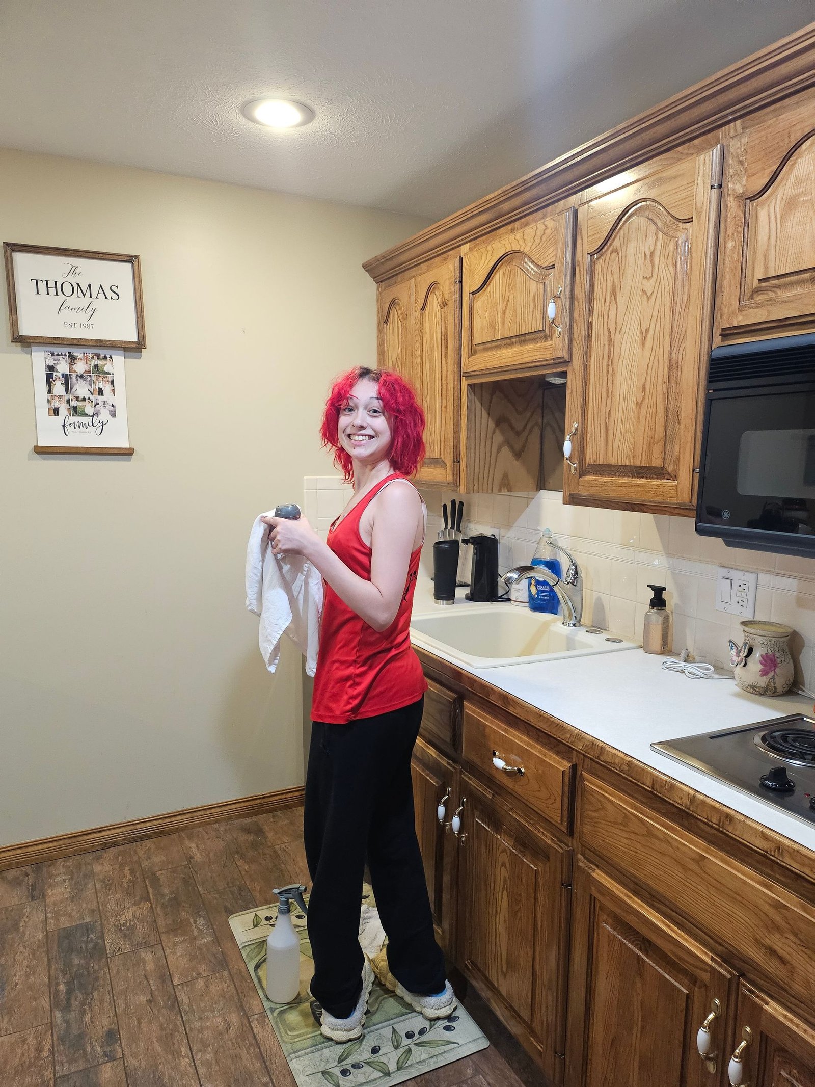 Team member cleaning a kitchen